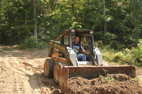 building a pond with a skid steer|2.5 acre pond skid steer.